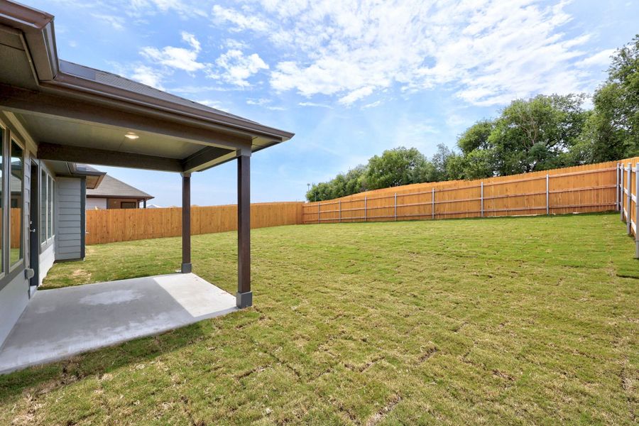 Exterior details and patio area of a home in Prairie Winds, Hutto (Image 4).
