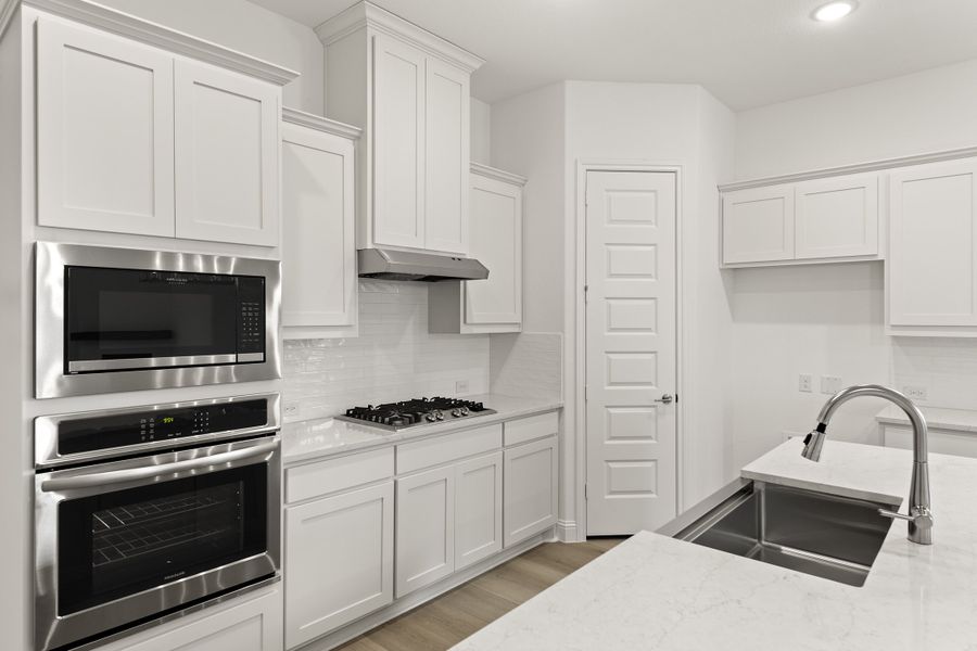 Representative furnished interior of a home built from the Brookstone I by Sandlin Homes in Timberbrook, Justin (Image 6).