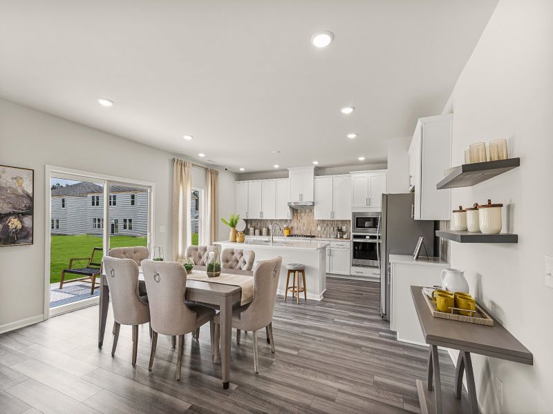 Great room in the Taylorsville floorplan at a Meritage Homes community in Wendell, NC.