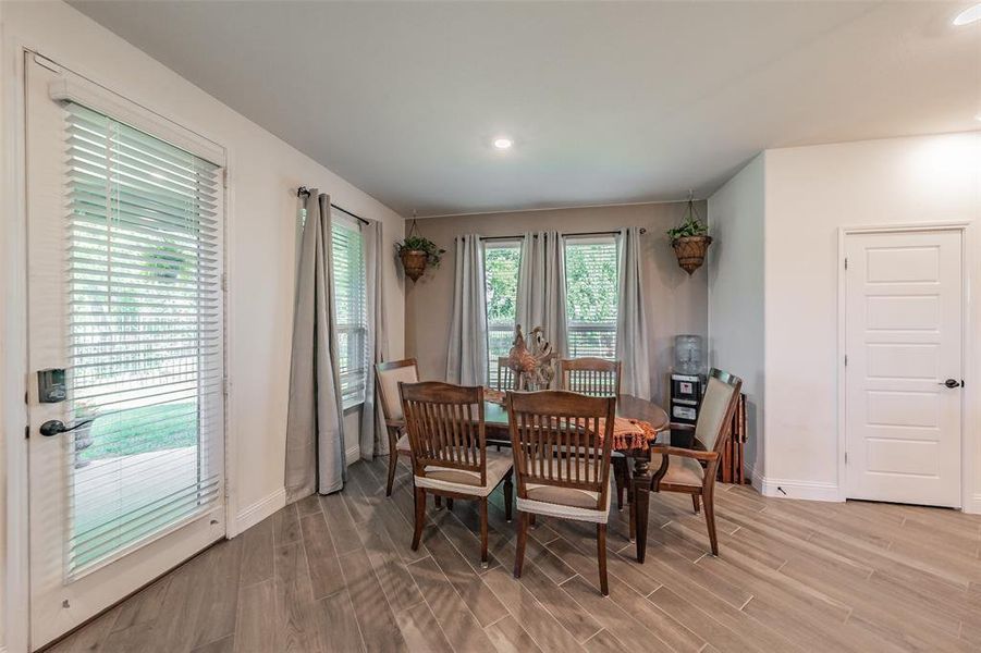 Overlook your beautiful yard while you dine