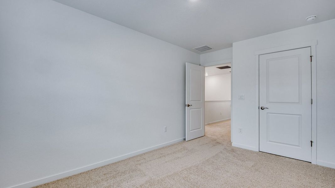 Spacious, unfurnished interior of a new home in Villas at Vantage, Berthoud (Image 15).