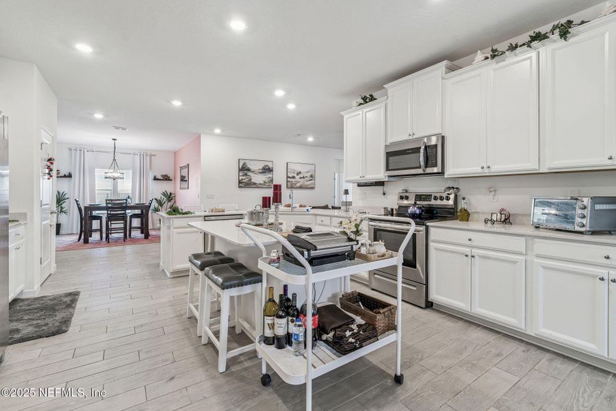 Furnished interior view inside a new home in Amelia Walk, Fernandina Beach (Image 5).