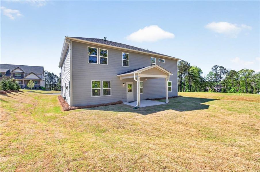 Exterior details and patio area of a home in Riversprings, Dacula (Image 31).
