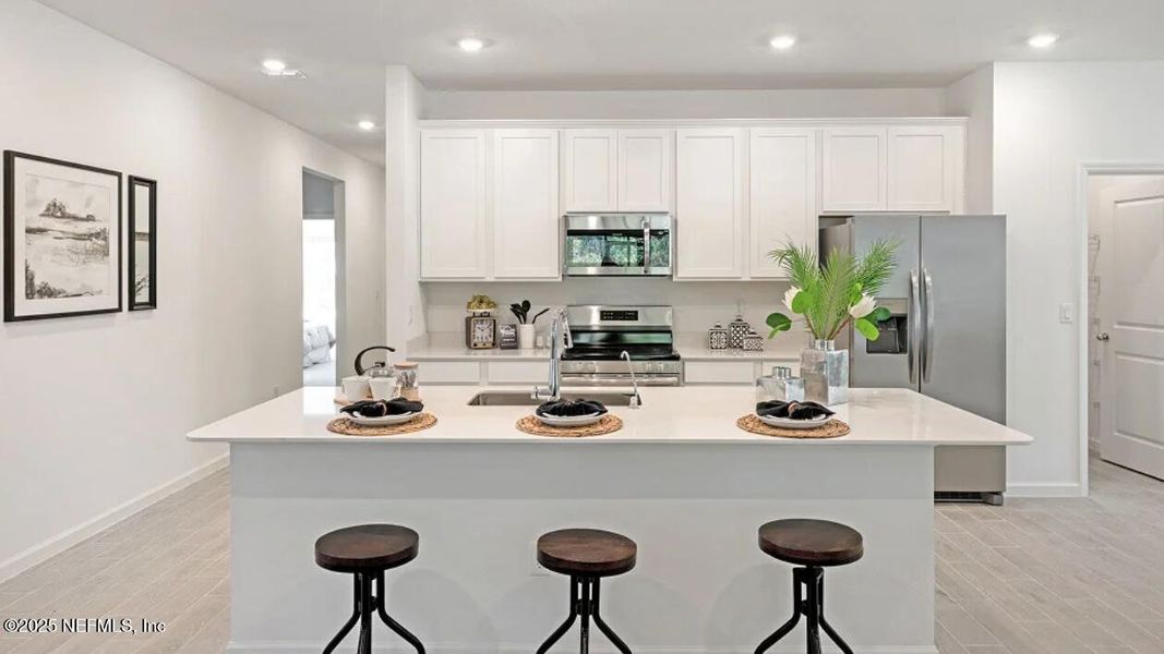 Furnished interior view inside a new home in Tributary: Tributary Royal Collection, Yulee (Image 11).