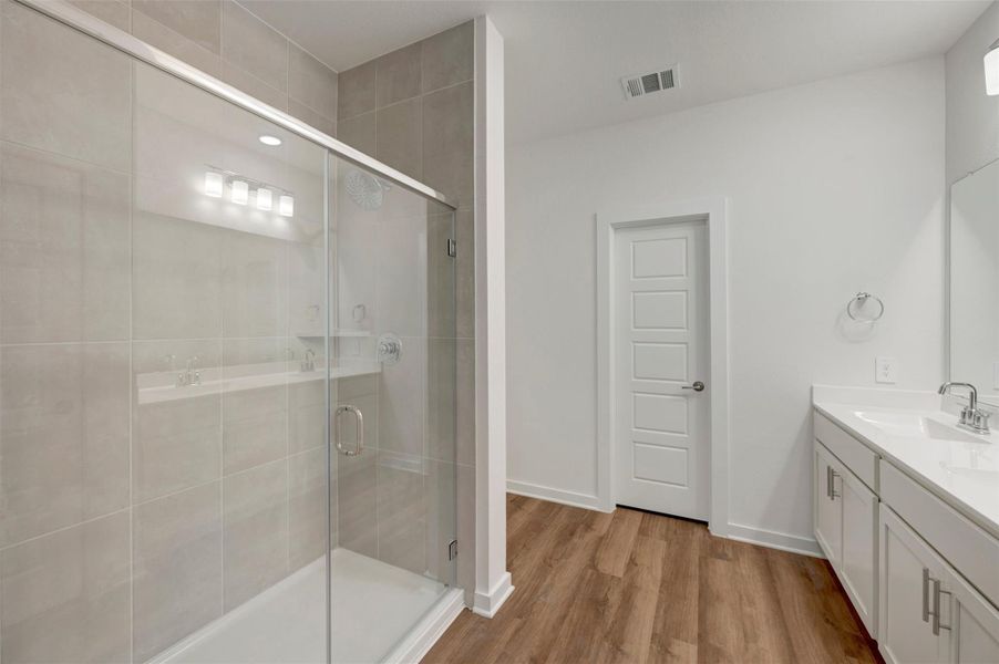 Furnished interior view inside a new home in Lone Star Landing, Montgomery (Image 15).