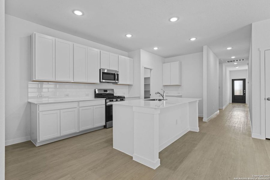 Furnished interior view inside a new home in , New Braunfels (Image 7).