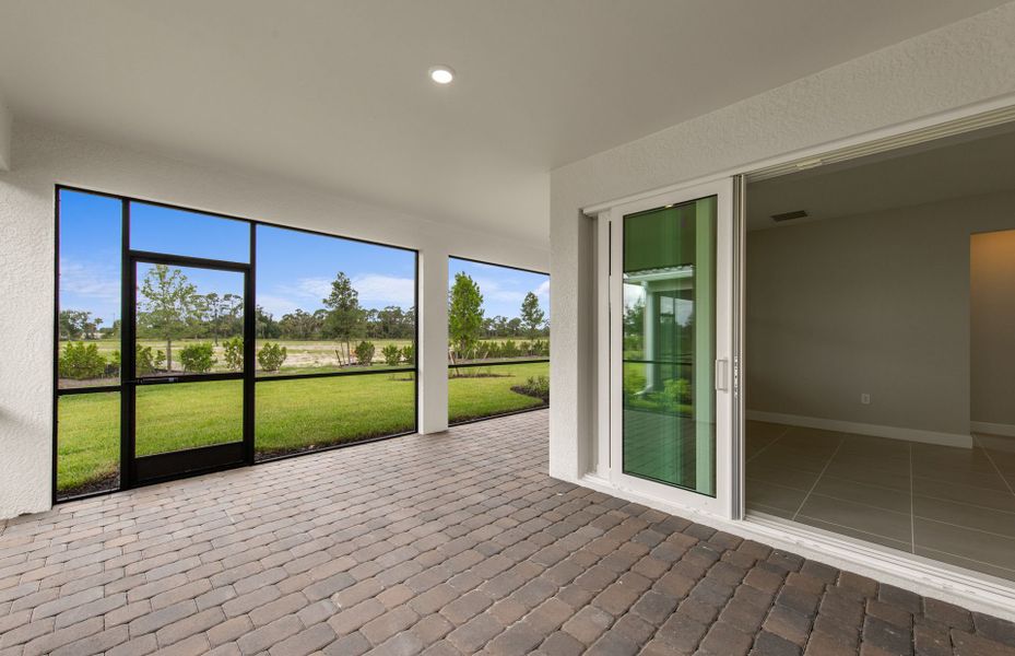 Exterior details and patio area of a home in Del Webb Oak Creek, North Fort Myers (Image 19).