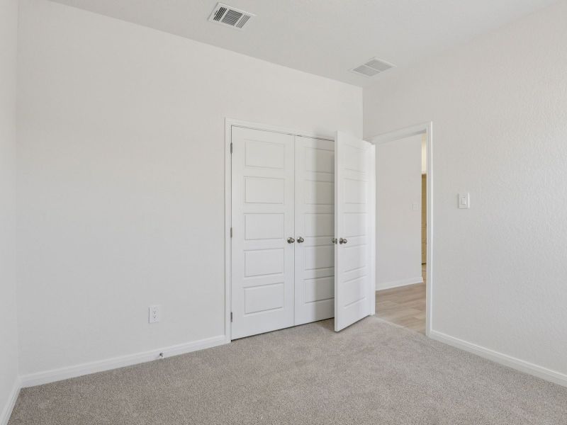 Guest bedroom in the Allen floorplan at a Meritage Homes community. Guest bedroom in the Allen floorplan at a Meritage Homes community.