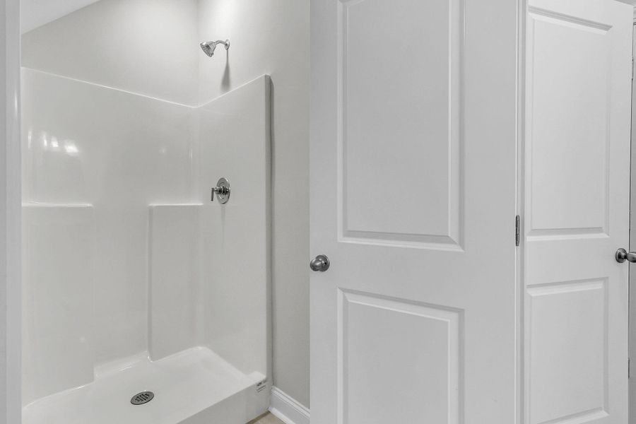 Furnished interior view inside a new home in Tidewater at Lakes of Cane Bay, Summerville (Image 7).