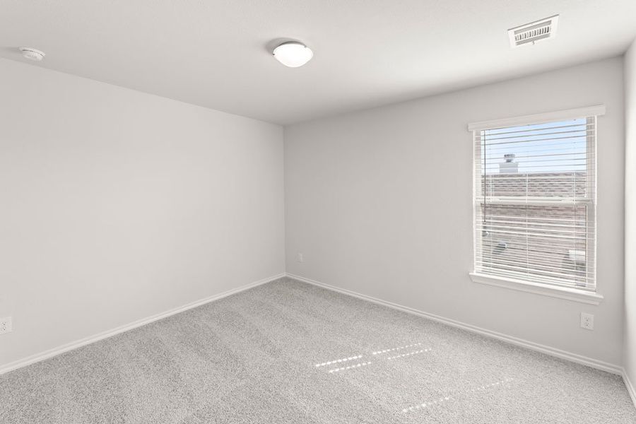 Front exterior of a new home in Creekside Ranch, Blue Ridge, TX, highlighting curb appeal (Image 9).