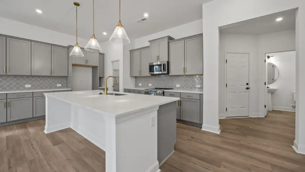 The Brentwood Plan by DRB Homes in River District, Charlotte NC.- Kitchen
