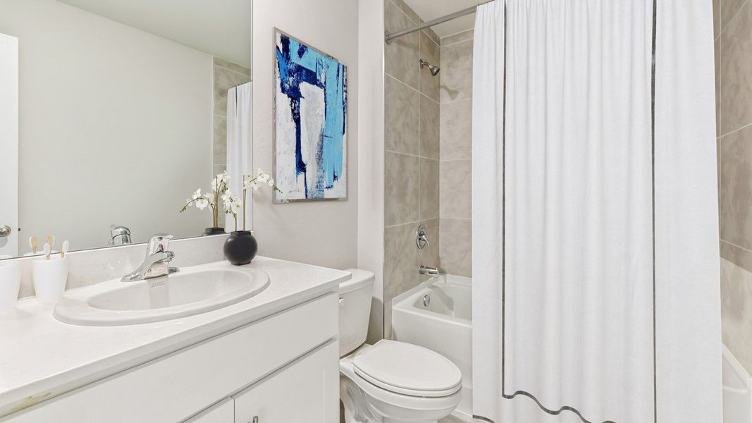 Representative furnished interior of a home built from the Freeport by D.R. Horton in LaBelle Homes, Lehigh Acres (Image 4).