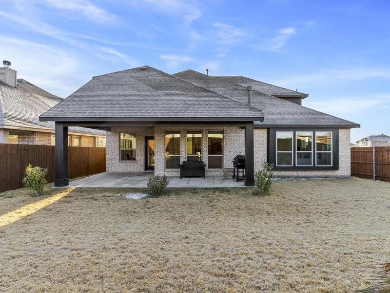 Exterior details and patio area of a home in Star Ranch, Godley (Image 31).