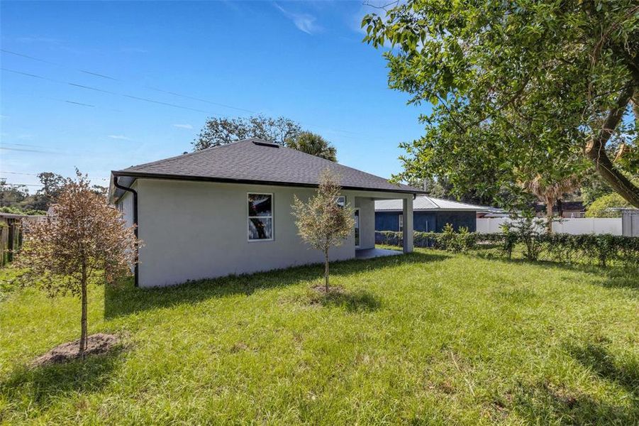 Front exterior of a new home in , Tampa, FL, highlighting curb appeal (Image 26).