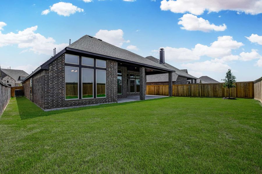 Representative exterior details of a home built from the 2688 by Ravenna Homes in The Woodlands Hills 65′, Willis (Image 18).