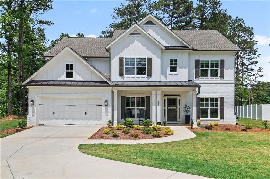 Front exterior of a new home in , Marietta, GA, highlighting curb appeal (Image 28).