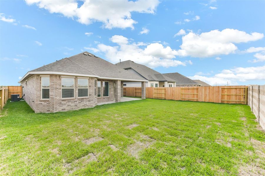Exterior details and patio area of a home in River Ranch Meadows, Dayton (Image 3).