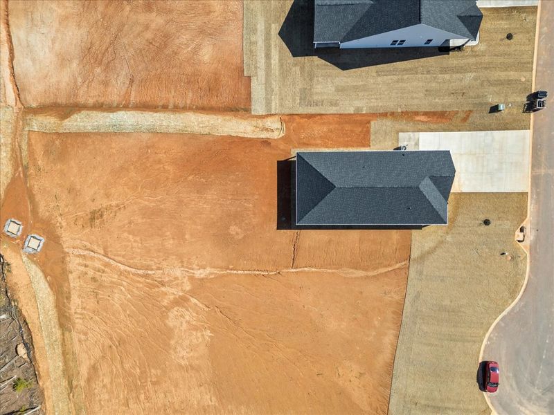 Site preparation for future homes built from the Cheshire by Enchanted Homes in Hampshire Heights, Moore (Image 37).