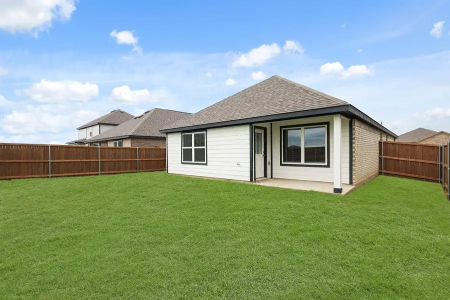 Front exterior of a new home in Burgess Meadows, Cleburne, TX, highlighting curb appeal (Image 1). Front exterior of a new home in Burgess Meadows, Cleburne, TX, highlighting curb appeal (Image 1).