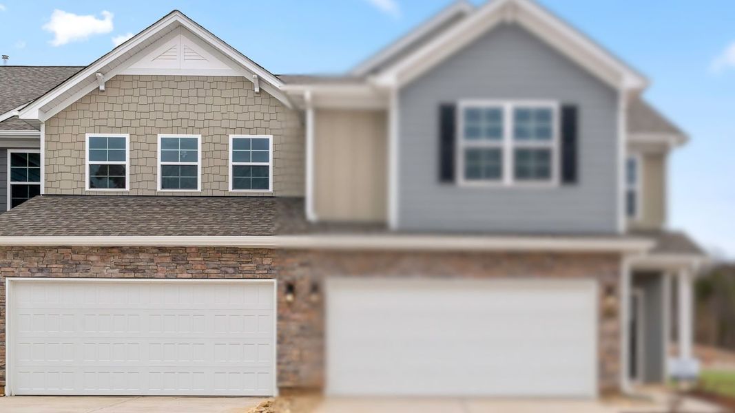 Front exterior of a new home in Lybrook Village, Advance, NC, highlighting curb appeal (Image 1). Front exterior of a new home in Lybrook Village, Advance, NC, highlighting curb appeal (Image 1).