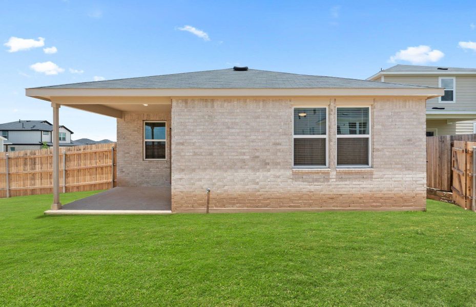 Exterior details and patio area of a home in Sunfield, Buda (Image 2). Exterior details and patio area of a home in Sunfield, Buda (Image 2).