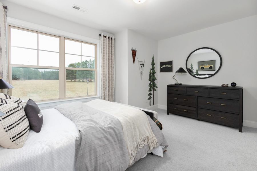 Representative furnished interior of a home built from the Hanover Lux by Keystone Homes NC in Weybridge, Burlington (Image 51).