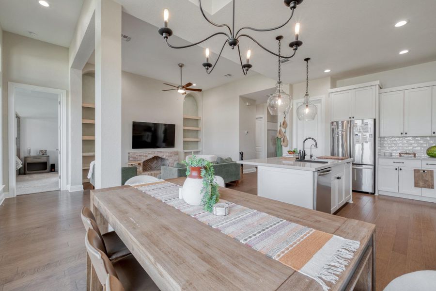 The dining area stays connected to the kitchen and living room without losing its own sense of place.