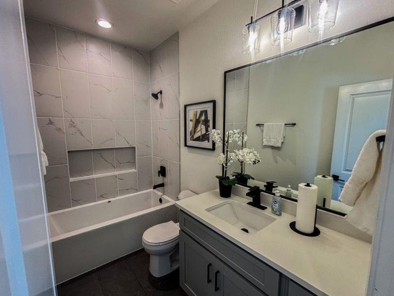 Furnished interior view inside a new home in Spring Branch Crossing, Conroe (Image 8).