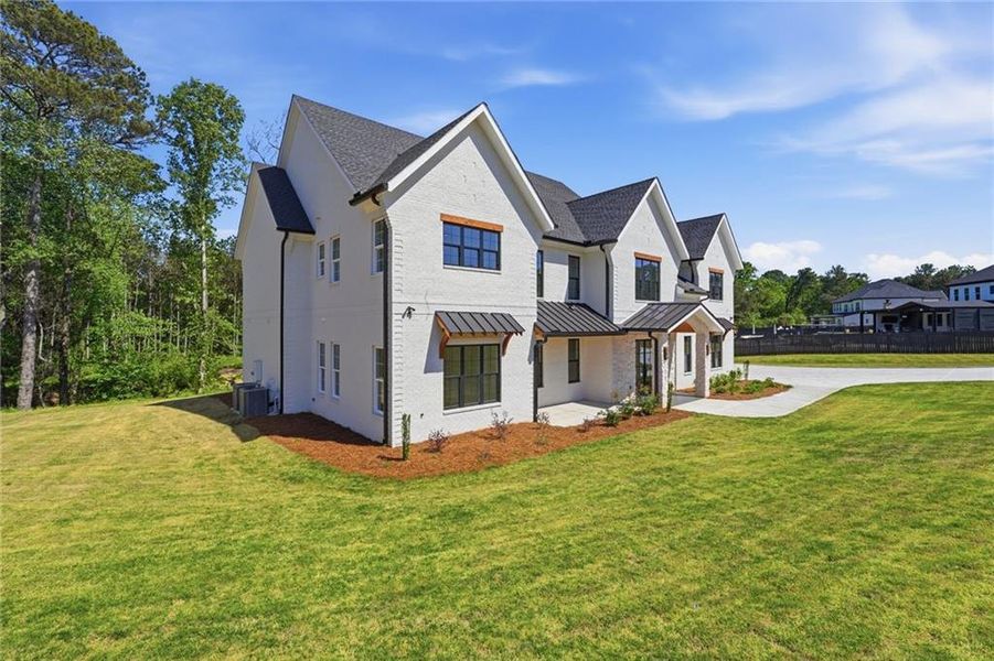 Front exterior of a new home in , Bethlehem, GA, highlighting curb appeal (Image 26).