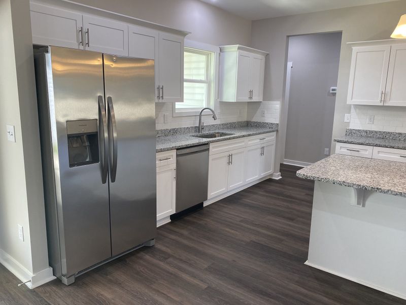 Representative furnished interior of a home built from the Pierce by Foundation Home Builders LLC in Old Hickory Crossing, Mocksville (Image 5).