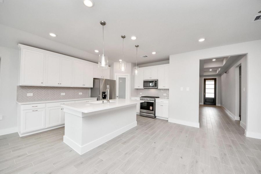 Furnished interior view inside a new home in Laurel Landing: Landmark Collection, Alvin (Image 11).