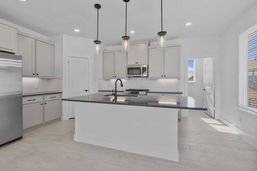 Furnished interior view inside a new home in Elyson Courtyard Collection, Katy (Image 5).