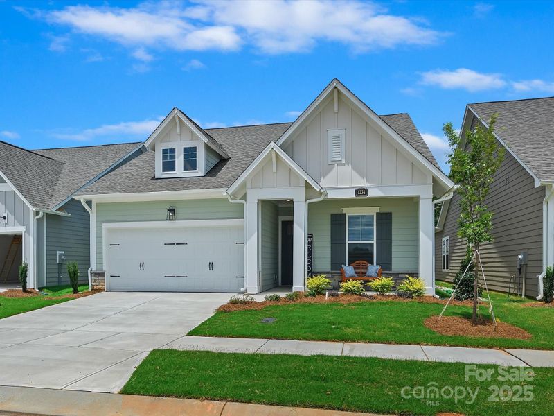 Front exterior of a new home in Encore at Streamside - Classic Series, Waxhaw, NC, highlighting curb appeal (Image 19).
