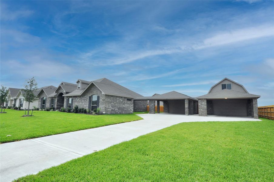 Front exterior of a new home in , League City, TX, highlighting curb appeal (Image 25).