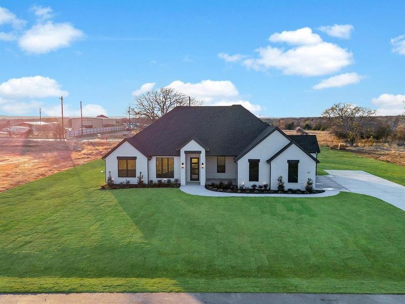 Front exterior of a new home in , Azle, TX, highlighting curb appeal (Image 25).