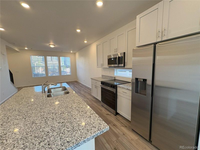 Furnished interior view inside a new home in Green Valley Ranch, Aurora (Image 14).