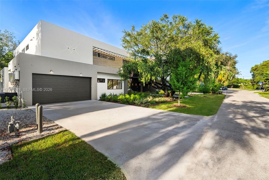 Front exterior of a new home in , South Miami, FL, highlighting curb appeal (Image 27).