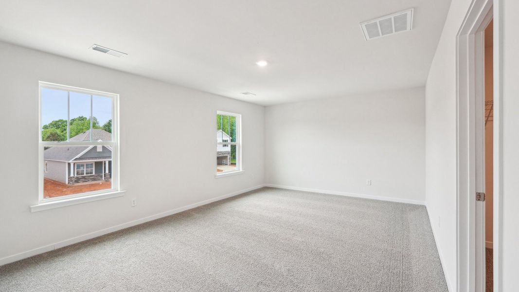 Spacious, unfurnished interior of a new home in Reedy Creek Preserve, Charlotte (Image 24).
