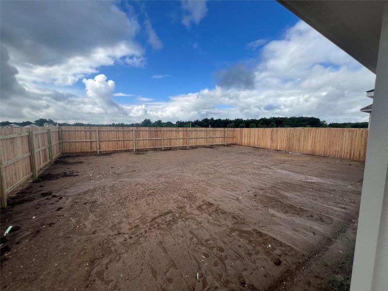 A spacious, newly fenced private yard awaits your landscaping vision.