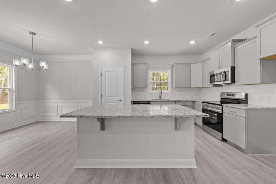 Furnished interior view inside a new home in East Lake, Leland (Image 4). Furnished interior view inside a new home in East Lake, Leland (Image 4).