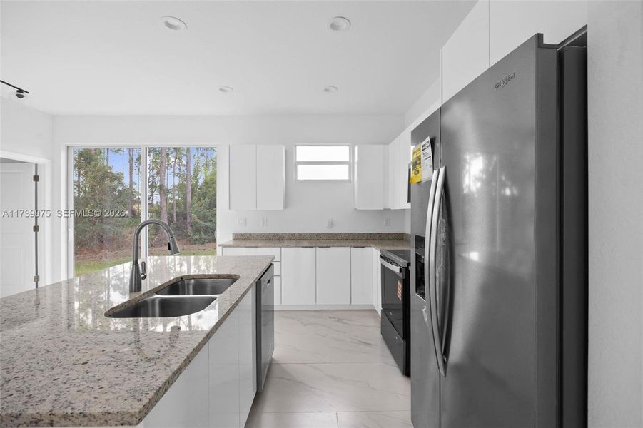 Furnished interior view inside a new home in , Lehigh Acres (Image 11). Furnished interior view inside a new home in , Lehigh Acres (Image 11).