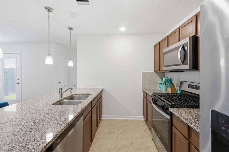 Furnished interior view inside a new home in , Katy (Image 9).