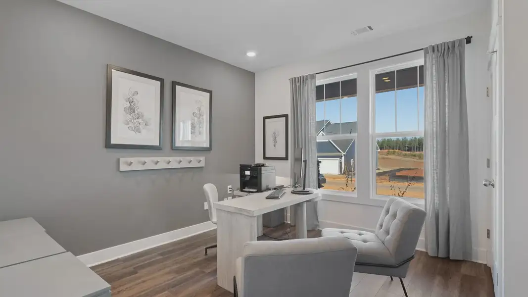 Representative furnished interior of a home built from the Cooper 3 by DRB Homes in Woodglen, Piedmont (Image 5).