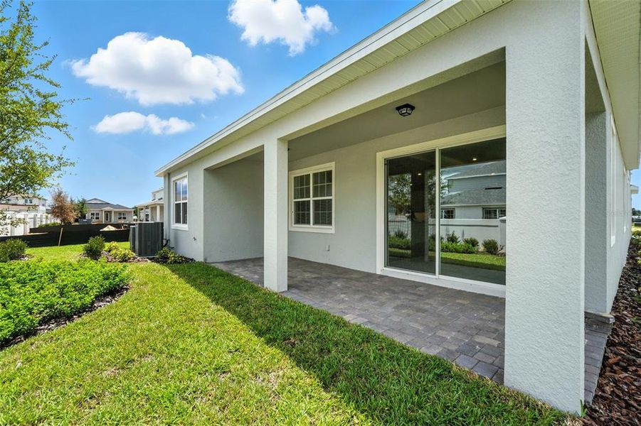 Front exterior of a new home in Winter Grove, Winter Garden, FL, highlighting curb appeal (Image 2).