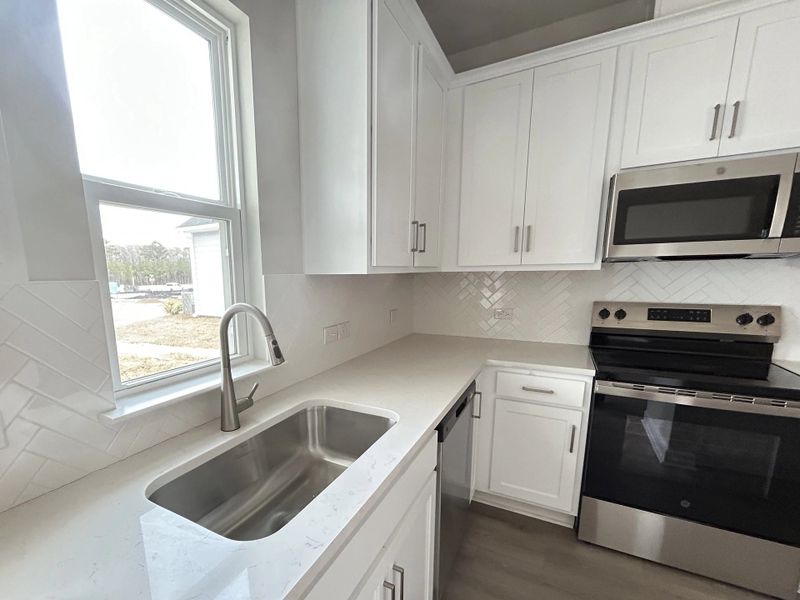 Furnished interior view inside a new home in Tea Farm, Ravenel (Image 4).