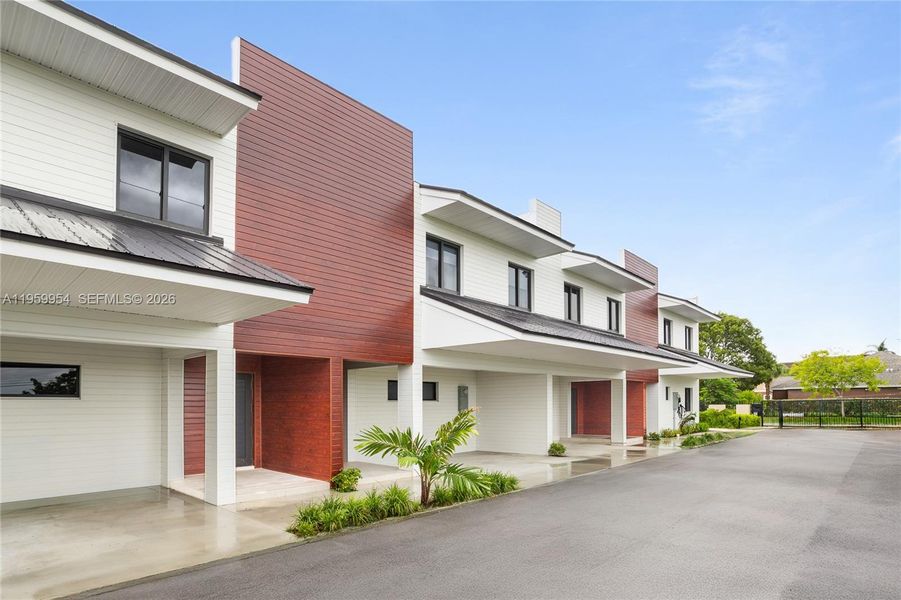 Front exterior of a new home in , Florida City, FL, highlighting curb appeal (Image 1). Front exterior of a new home in , Florida City, FL, highlighting curb appeal (Image 1).