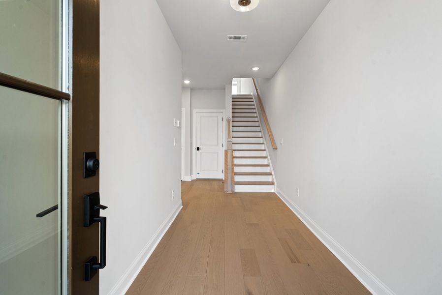 Representative unfurnished interior of a home built from the 
                        
                         by The Providence Group in Ward's Crossing Townhomes, Johns Creek (Image 26).