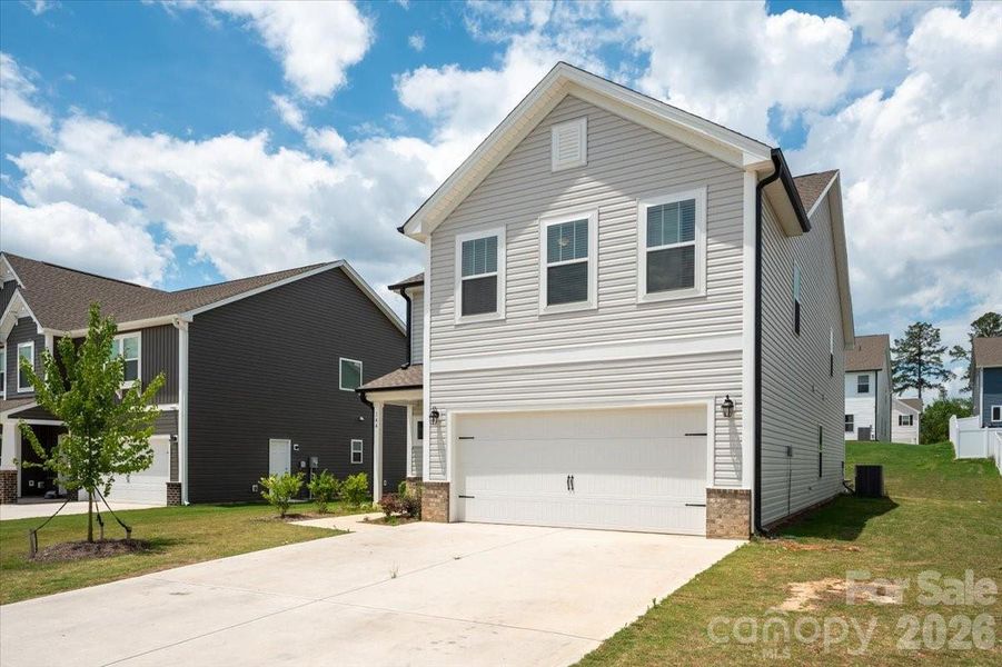 Front exterior of a new home in , Oakboro, NC, highlighting curb appeal (Image 26).