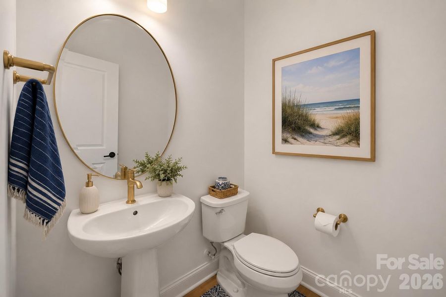 Half bath staged with AI. See how cute it looks! Half bath staged with AI. See how cute it looks!