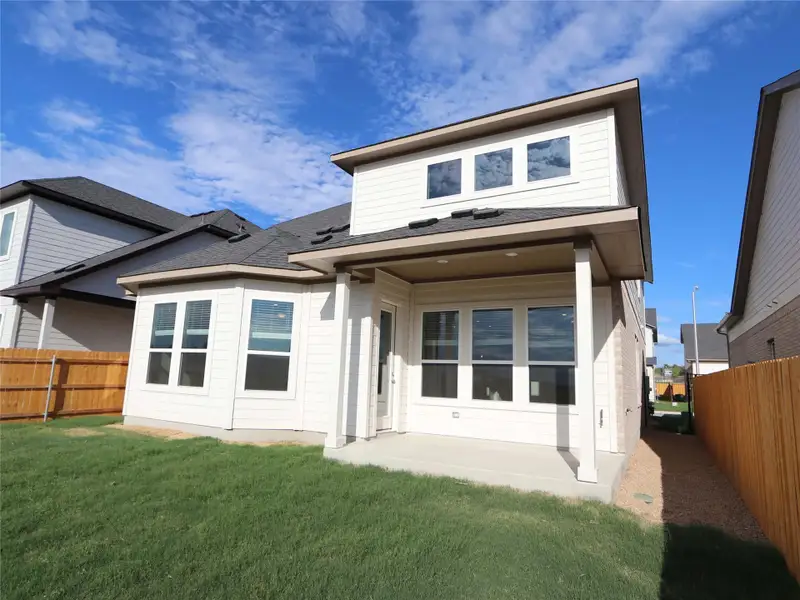 Exterior details and patio area of a home in Estancia West, Manchaca (Image 2). Exterior details and patio area of a home in Estancia West, Manchaca (Image 2).